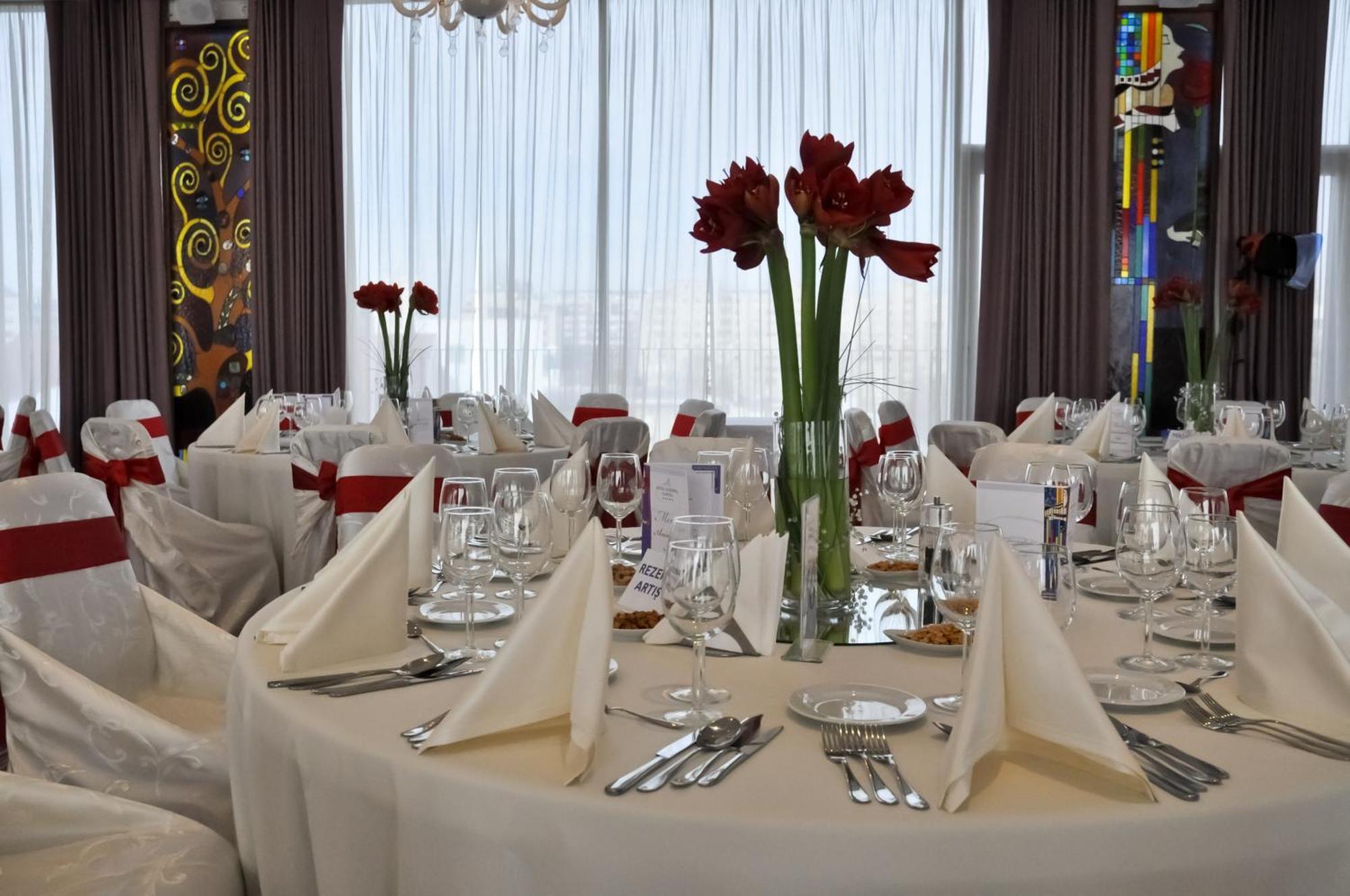 Marshal Garden Hotel Bukarest Exteriör bild A table set for a formal dinner